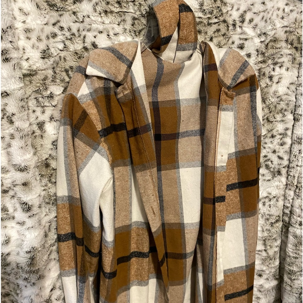 brown and white pleated button up jacket
